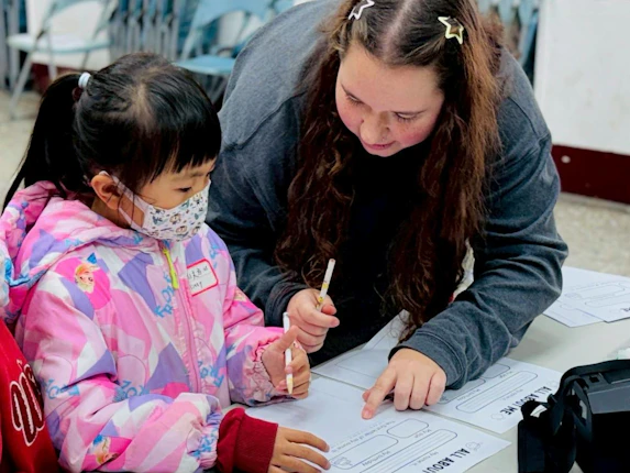 MaryQuinn Mills teaches students in grades 1-8 on the Matsu Islands.