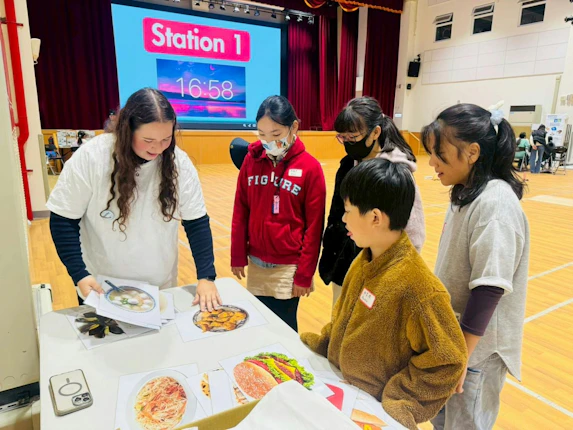 MaryQuinn Mills teaches students in grades 1-8 on the Matsu Islands.
